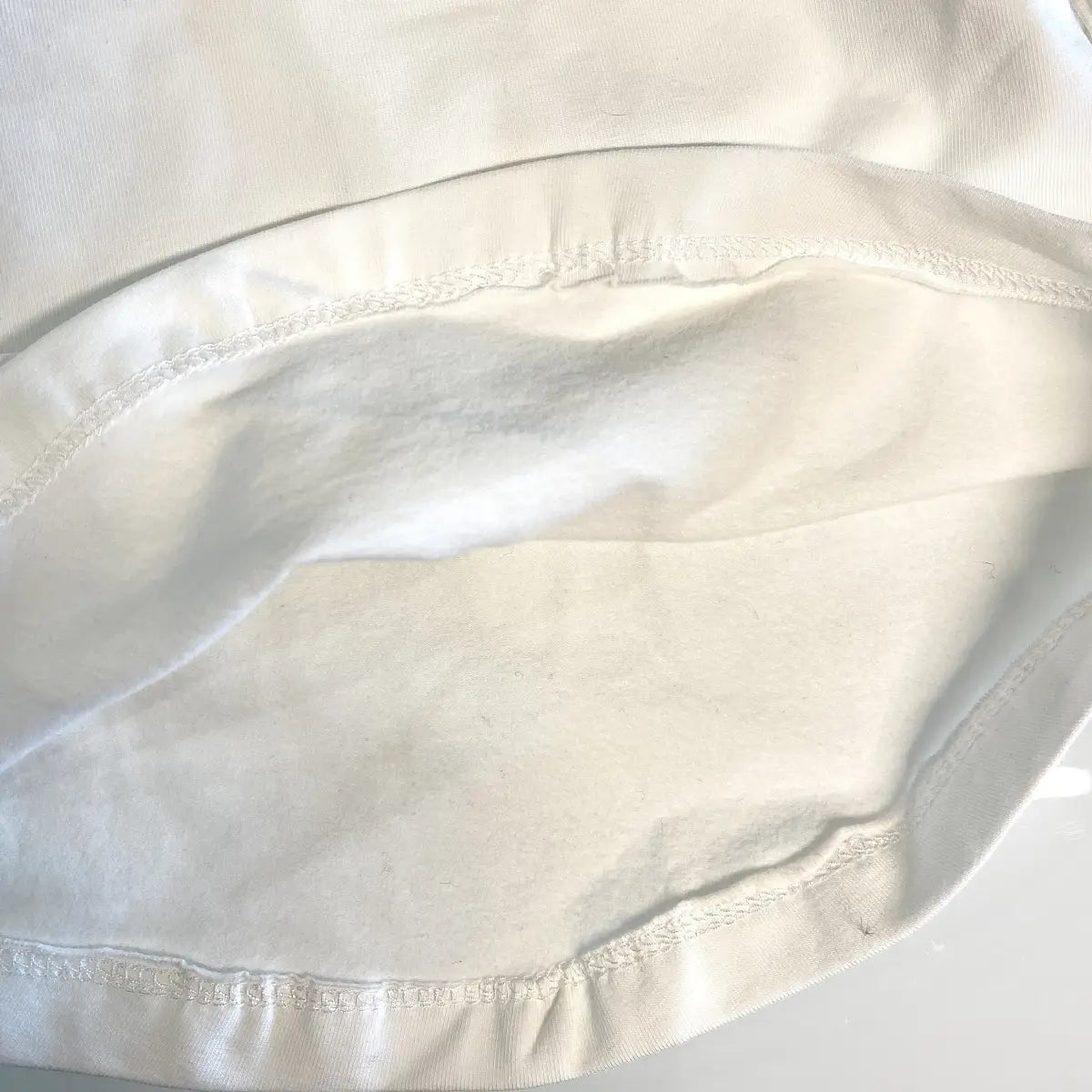 Maglia per bambina con cappuccio in tulle
