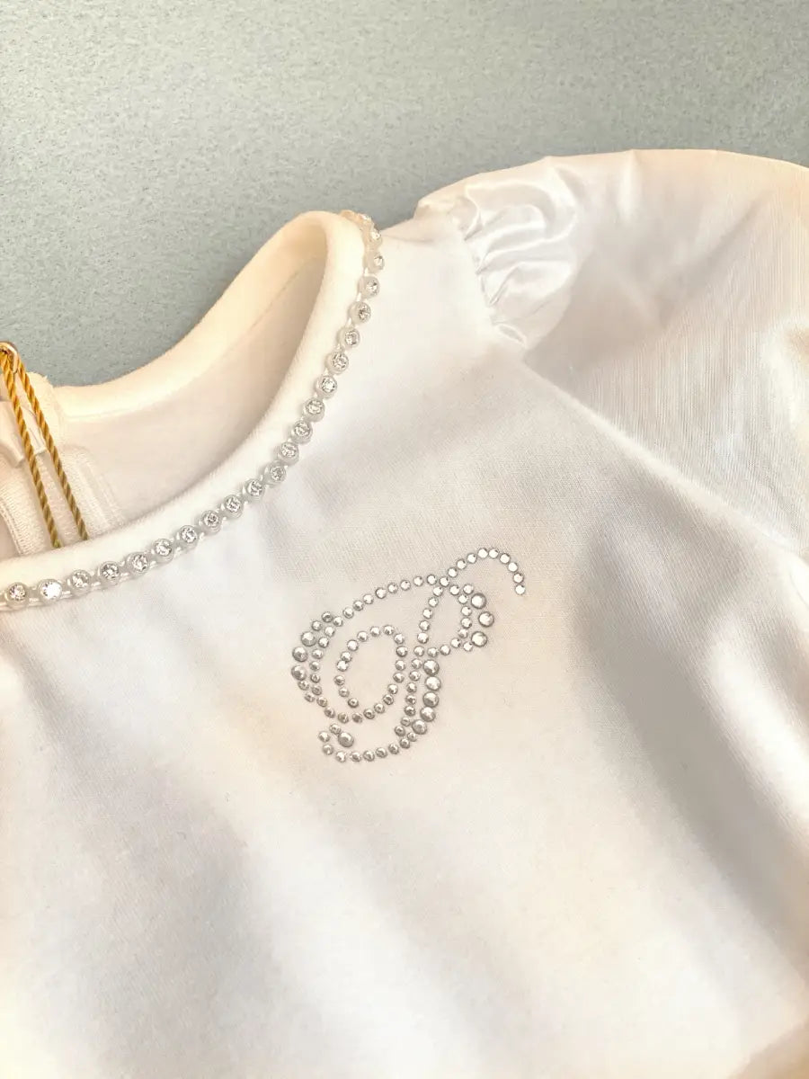 Mini abito con balze colore bianco per bambina