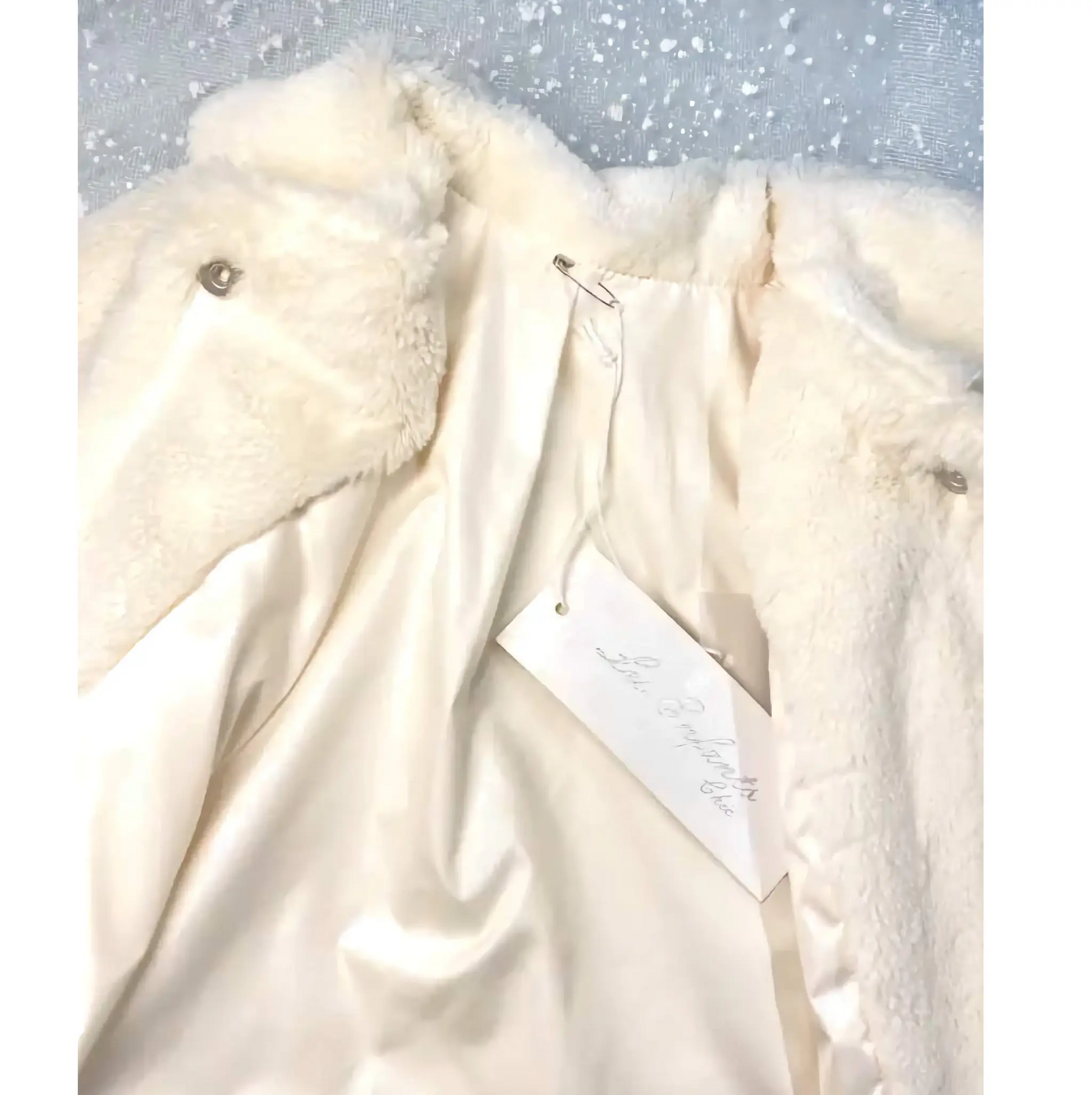 Pellicciotto bianco per bambina