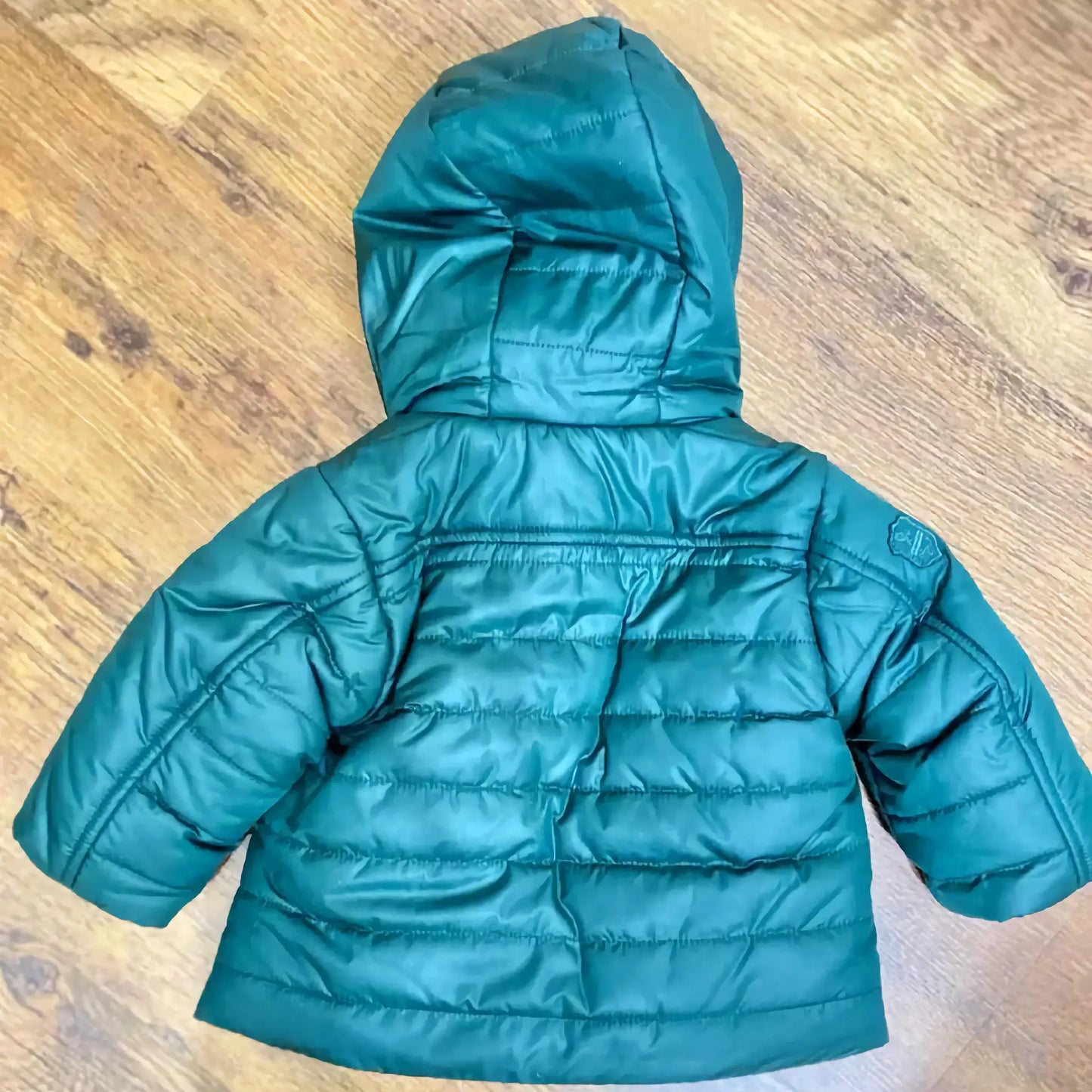 Piumino baby verde smeraldo in offerta