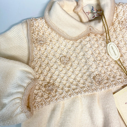 Tutina neonata in lana lavorata in offerta