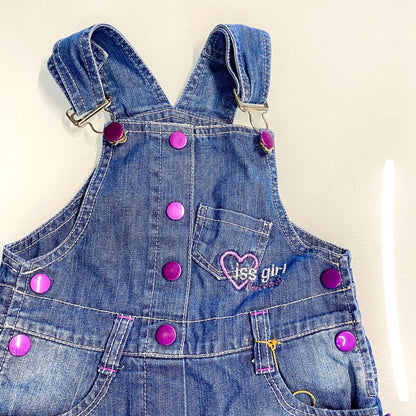 Salopette in jeans con balze floreali – 30 mesi