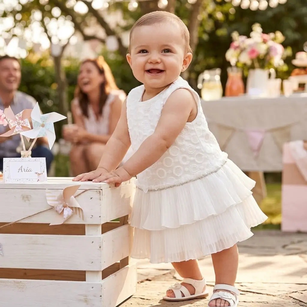 abito elegante scamiciato con gonna plissetatta per neonata in OUTLET