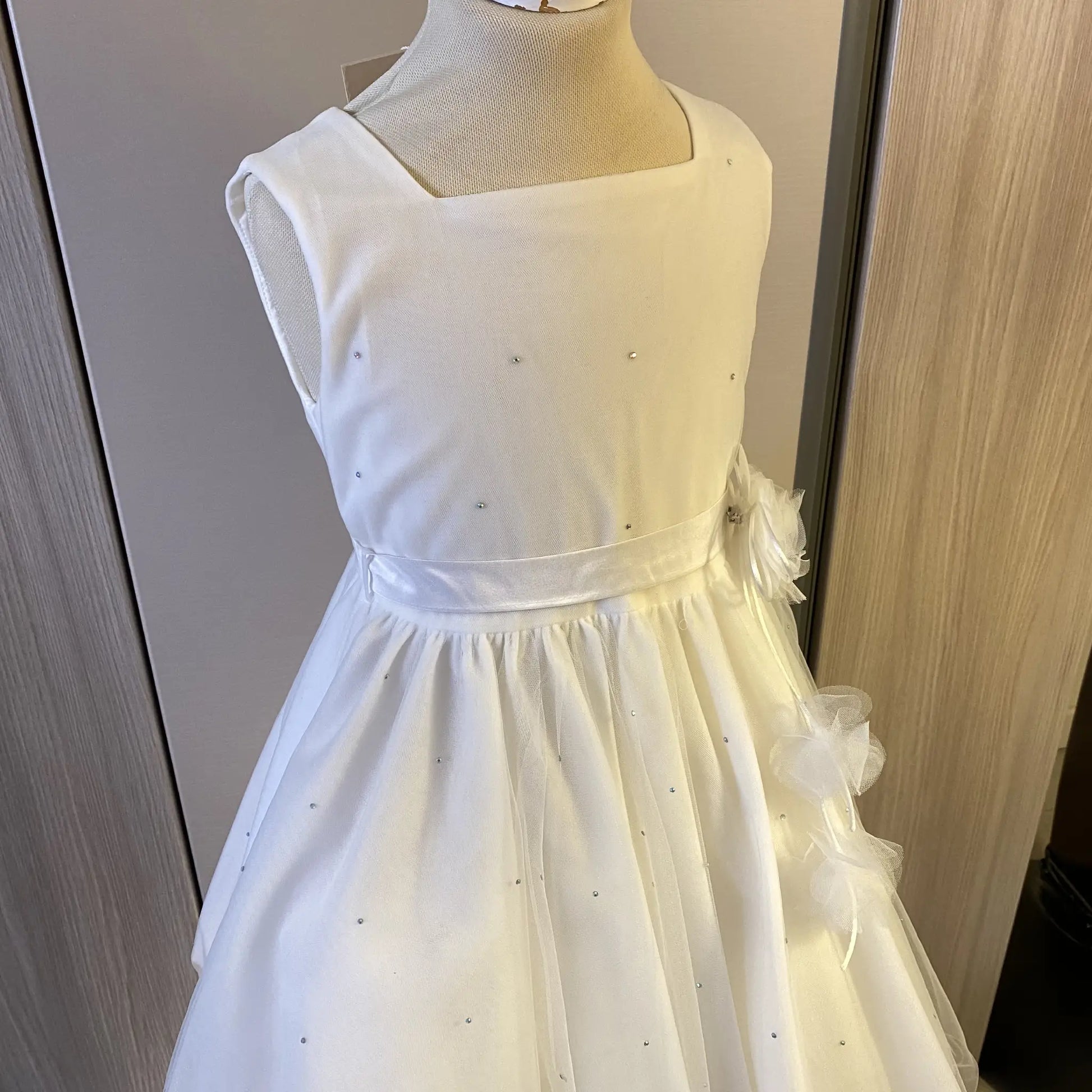 Abito in tulle con punti luce per bambina damigella d'onore