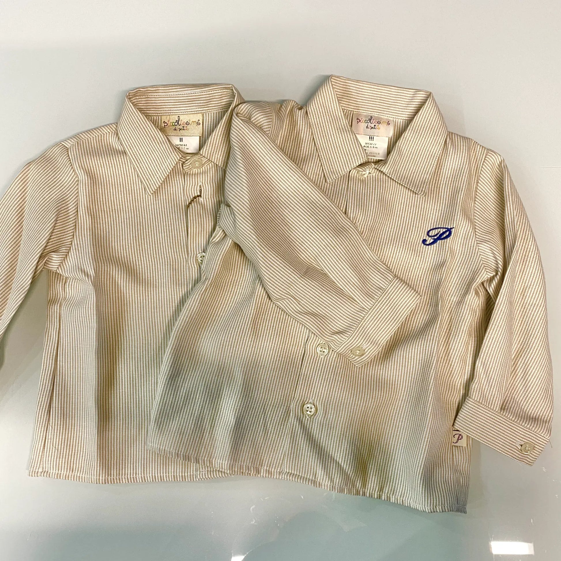 Camicia da neonato a righe beige in offerta