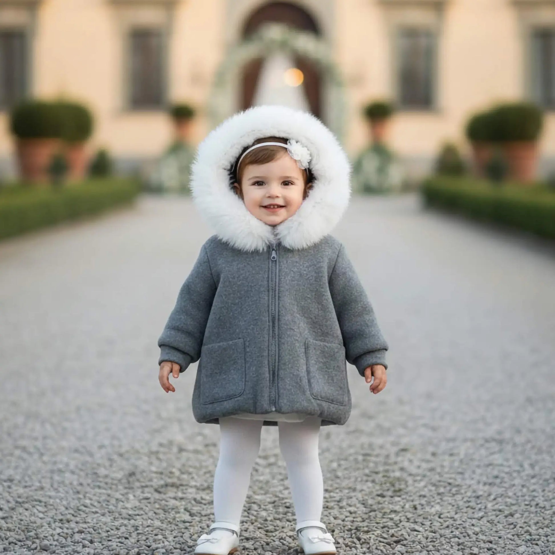 Cappottino elegante in maglia per neonato in OUTLET