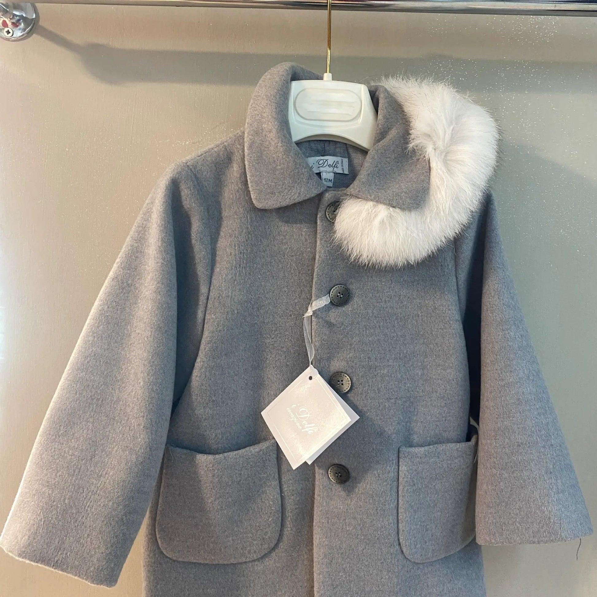 Cappottino con pellicciotto staccabile per bambino in lana