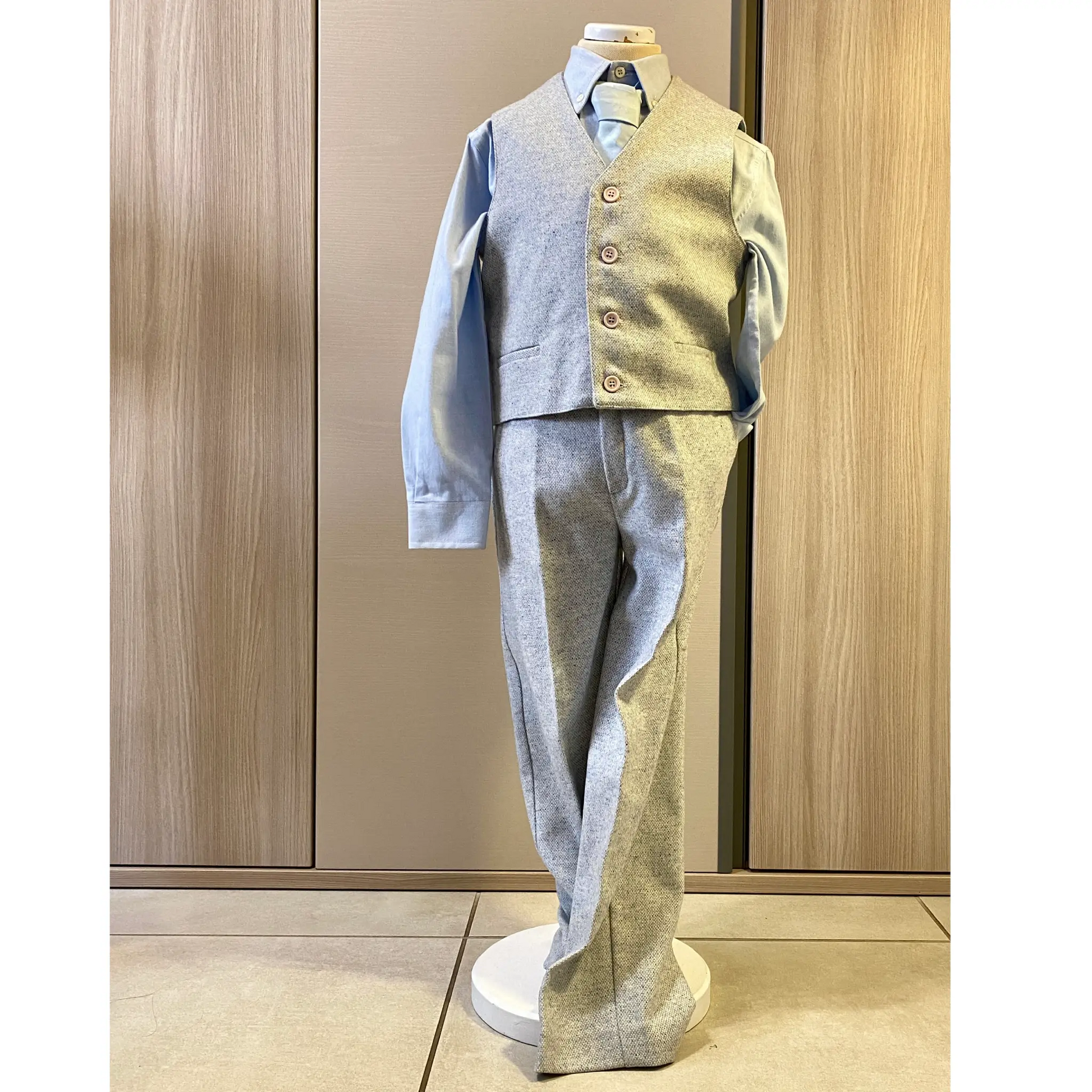 Completo in lana per bambino di 7 anni: panciotto, pantaloni, camicia e cravattino