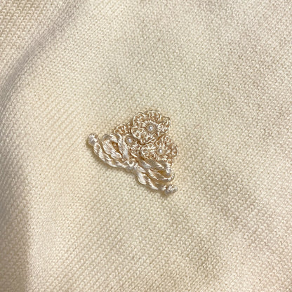 Copertina culla in lana lavorata color avorio 