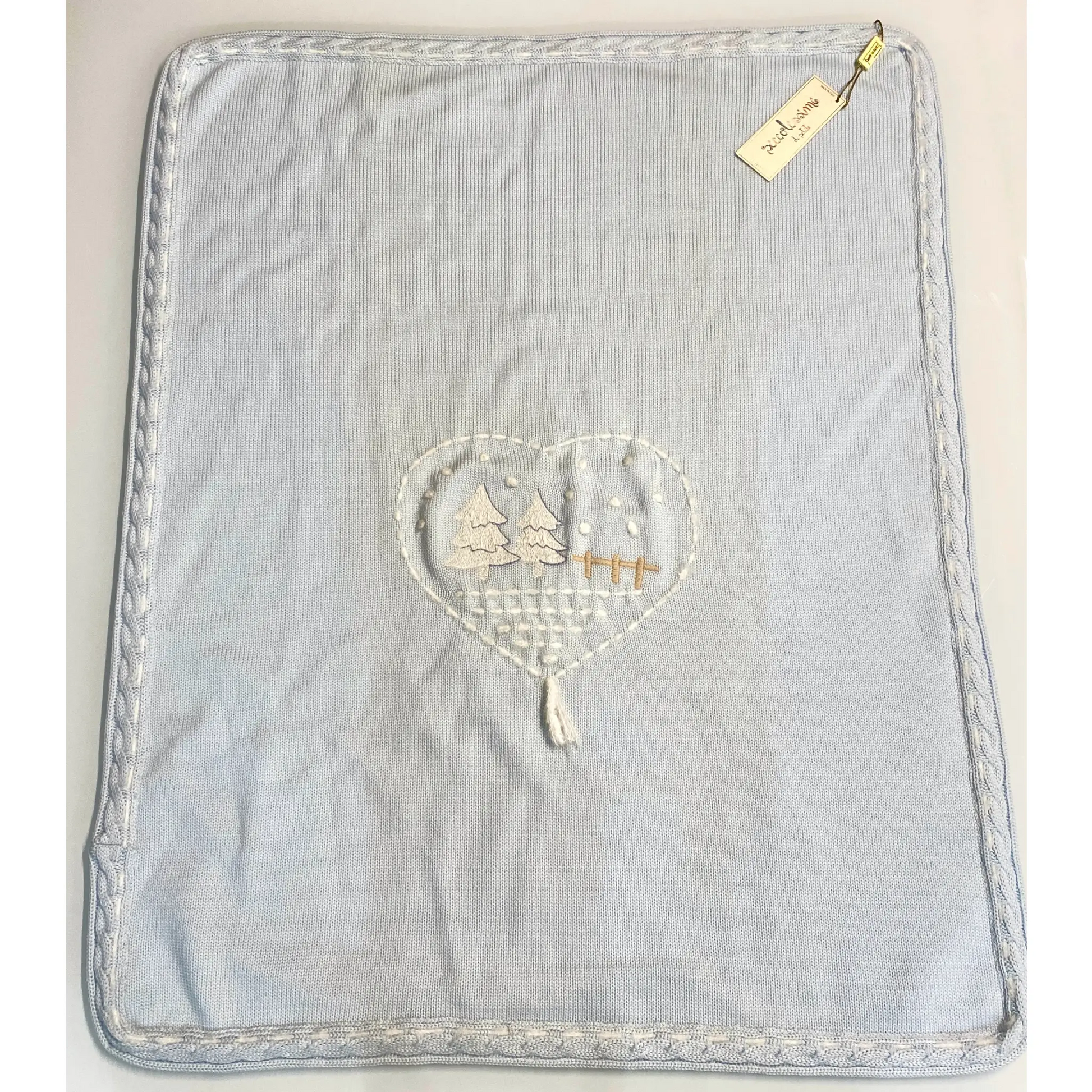 Copertina da culla in lana 100% con disegno invernale in Outlet