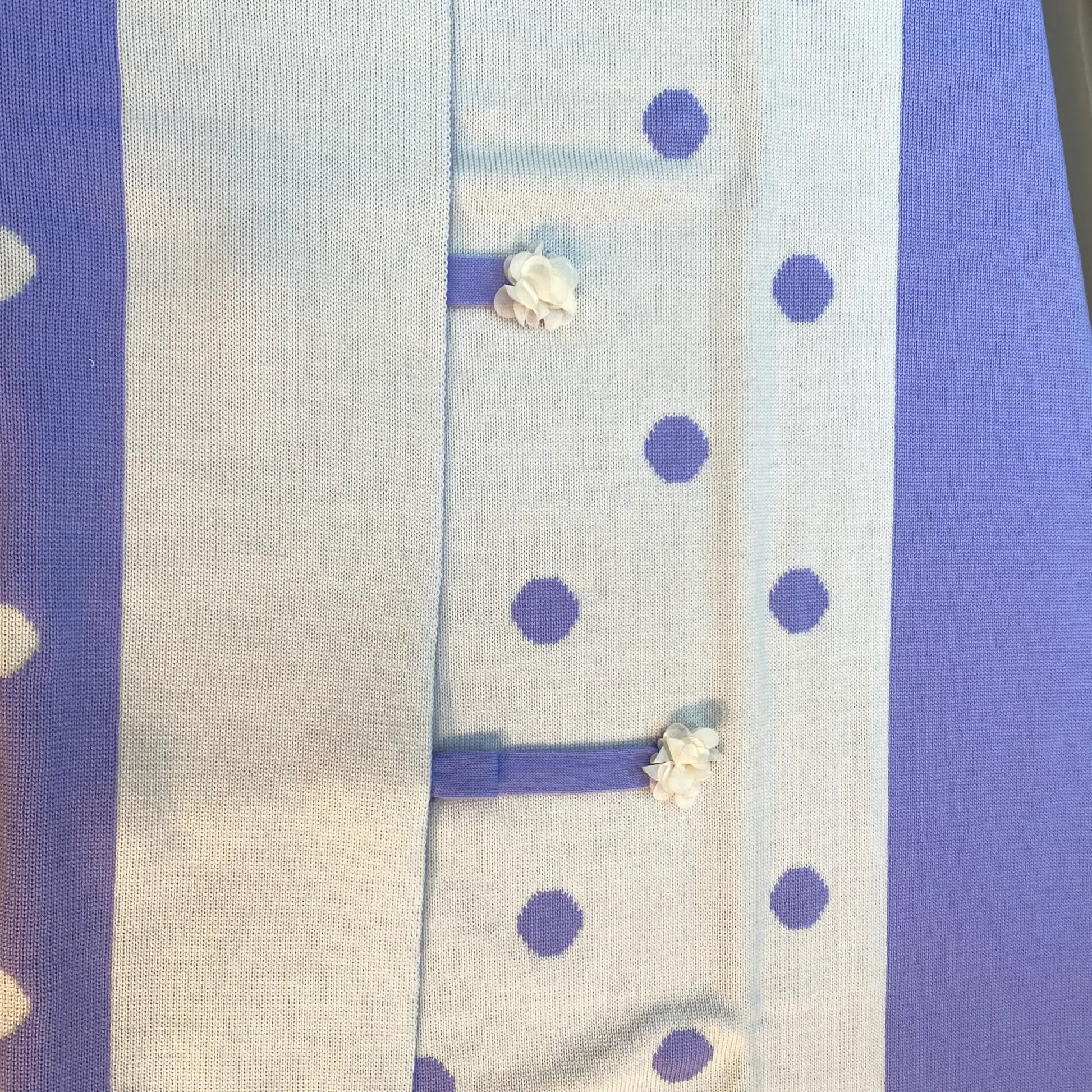 Copertina neonata color panna e lilla scontata