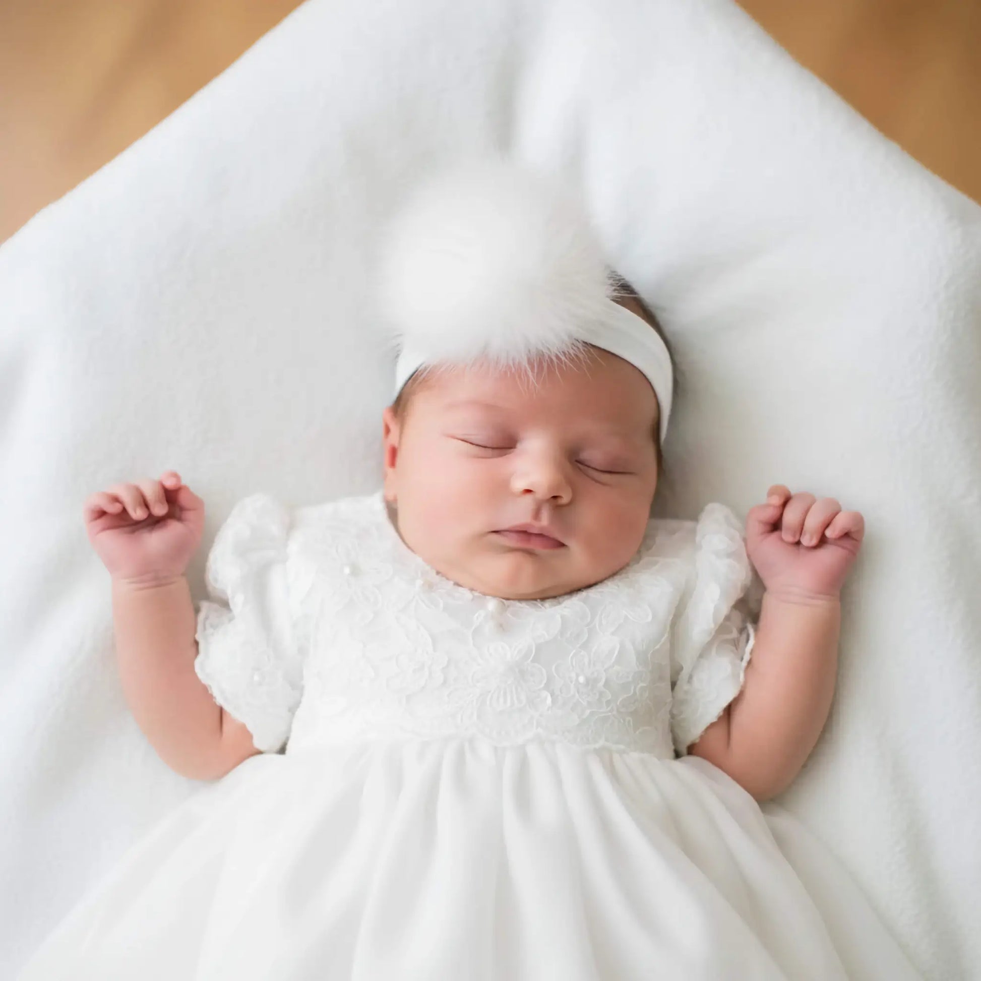 Fascia elastica con pom pom da battesimo in OUTLET