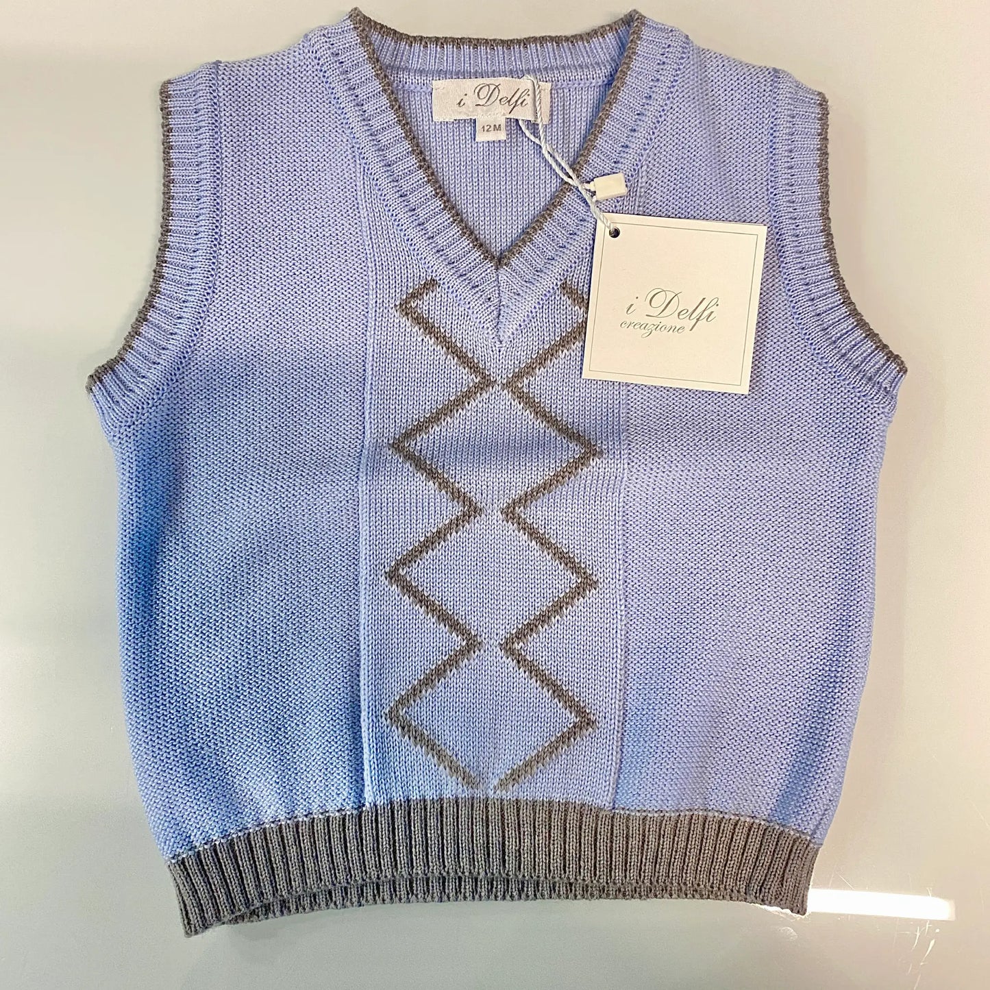Gilet neonato in lana color azzurro cielo in outlet