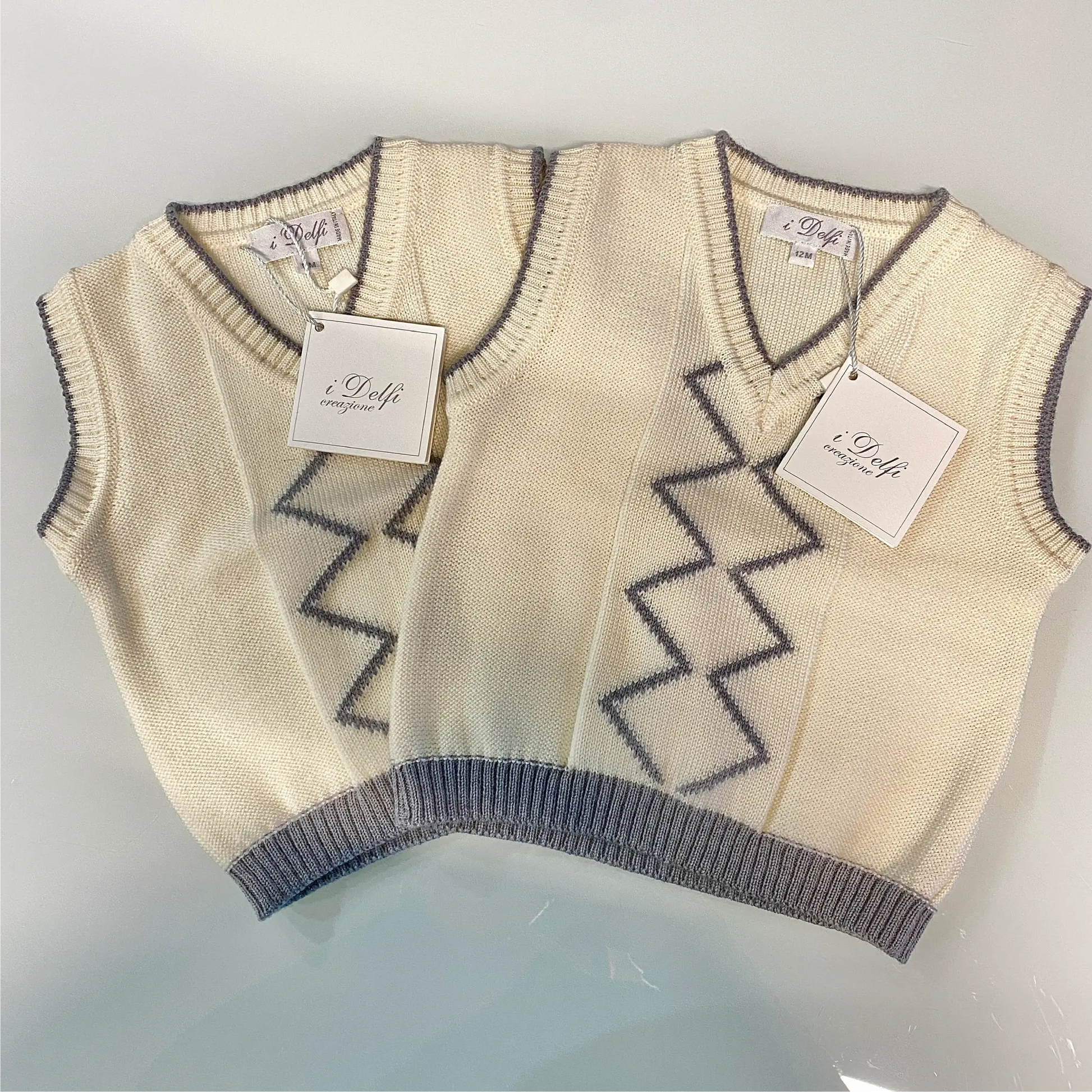 Gilet neonato invernale elegante panna e grigio