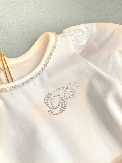 Mini abito con balze colore bianco per bambina