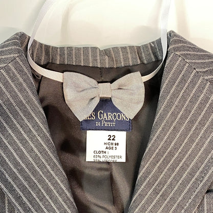 Papillon bimbo grigio a righe esempio di abbinamento