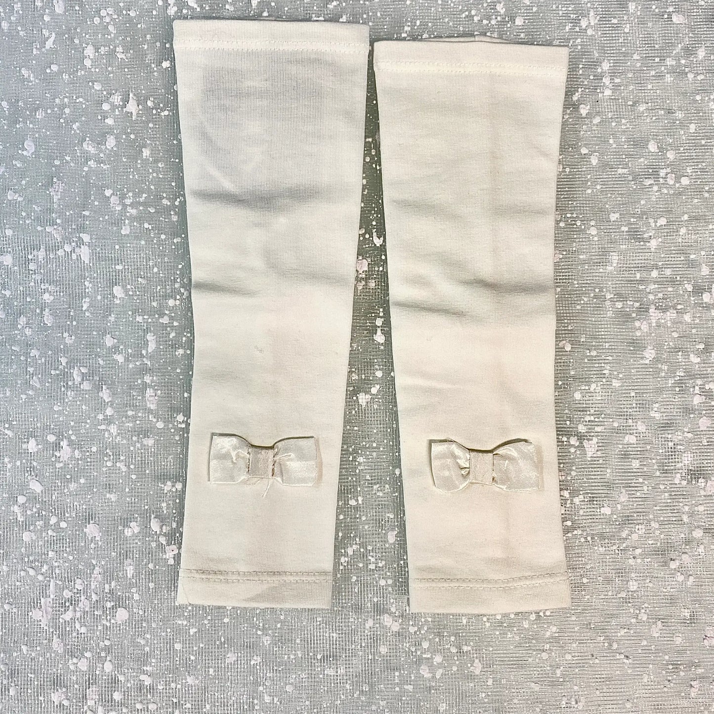 Scaldabraccia con fiocco per bambina di 3 anni in outlet