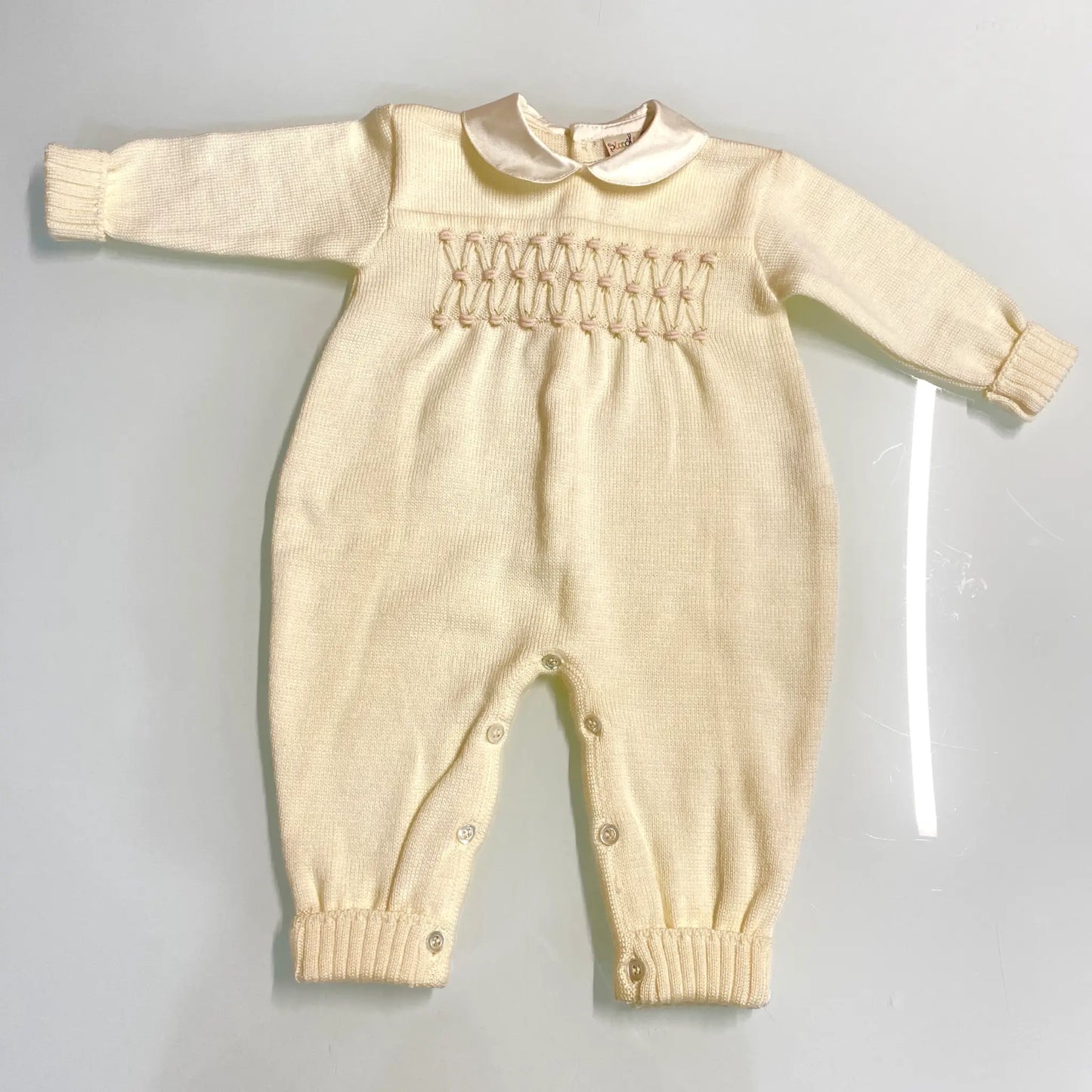 Tutina intera da neonata con Punto Smock in Outlet