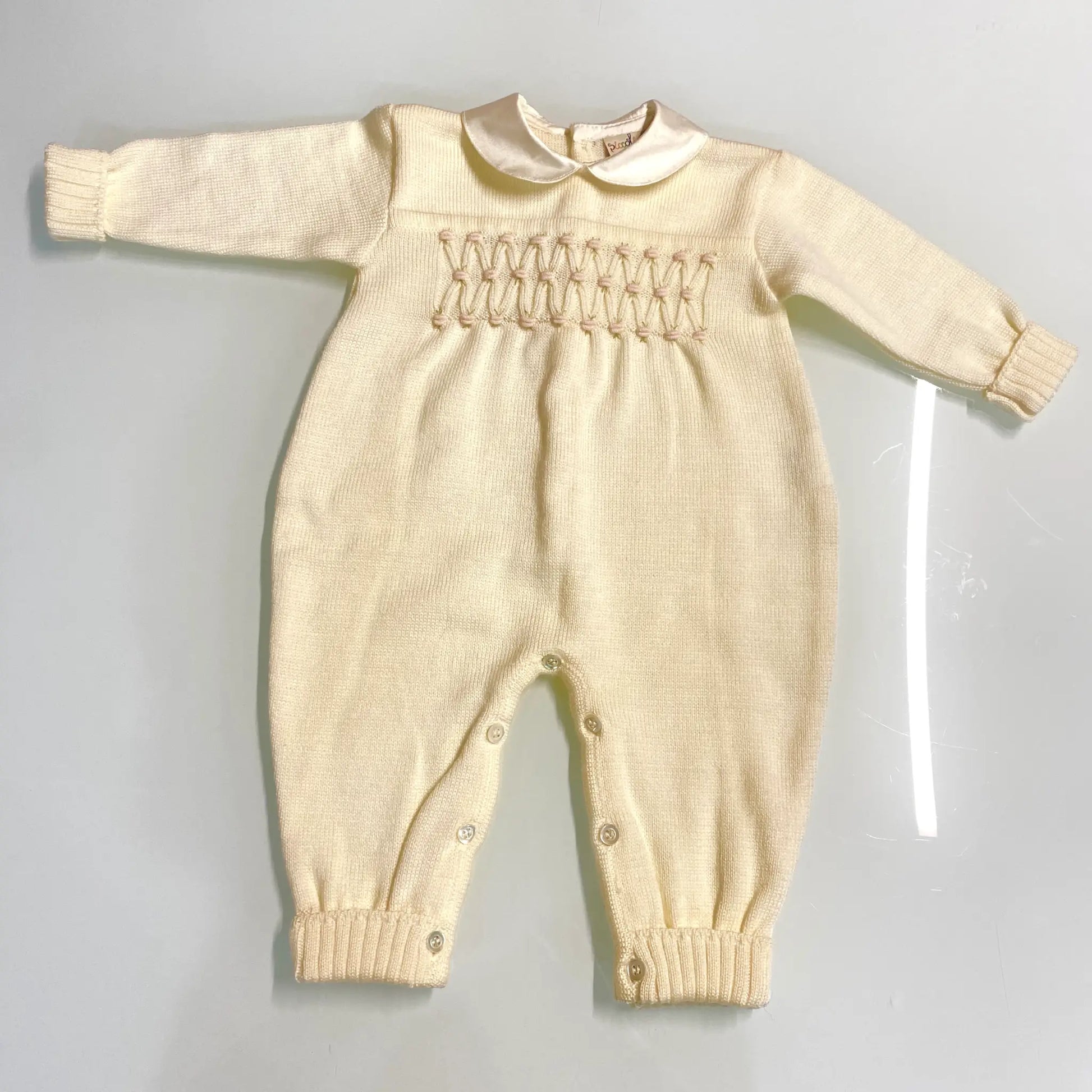 Tutina intera da neonata con Punto Smock in Outlet