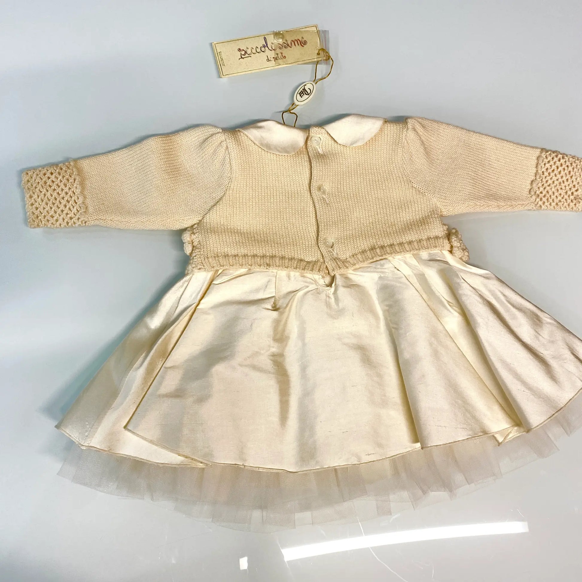 Vestina neonata in lana e raso in outlet